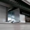 ys321-brk_vari_ci_near.jpg Konzol akkumulátor tolóajtó automatika sínre rögzítéséhez